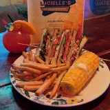 Stacked BLT with fries and corn on the cob